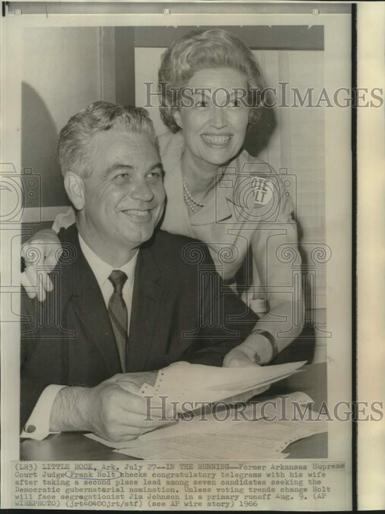 1966 Frank Holt and wife check congratulatory telegrams in Arkansas - Historic Images