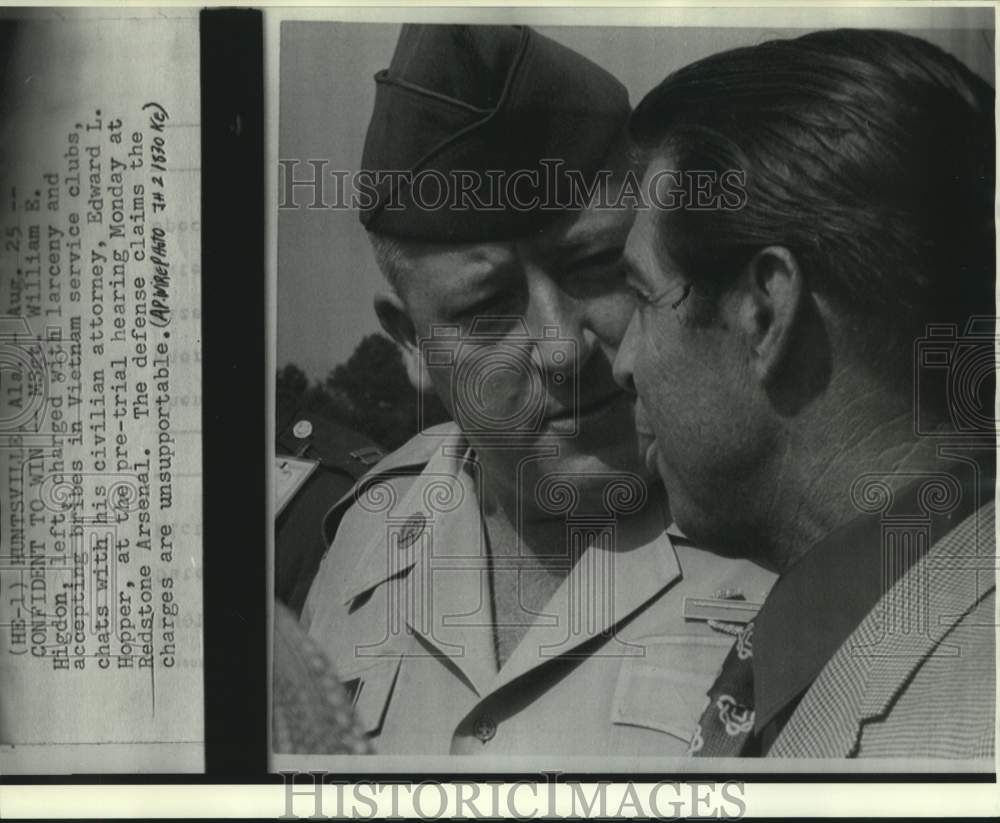 1970 MSgt. William Higdon and attorney Hopper chat at Redstone - Historic Images