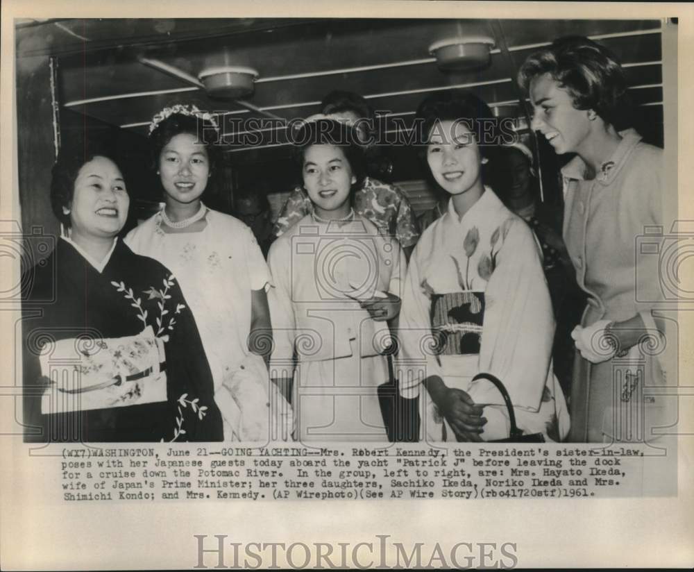 1961 Mrs. Robert Kennedy and Mrs. Ikeda and daughters aboard yacht - Historic Images