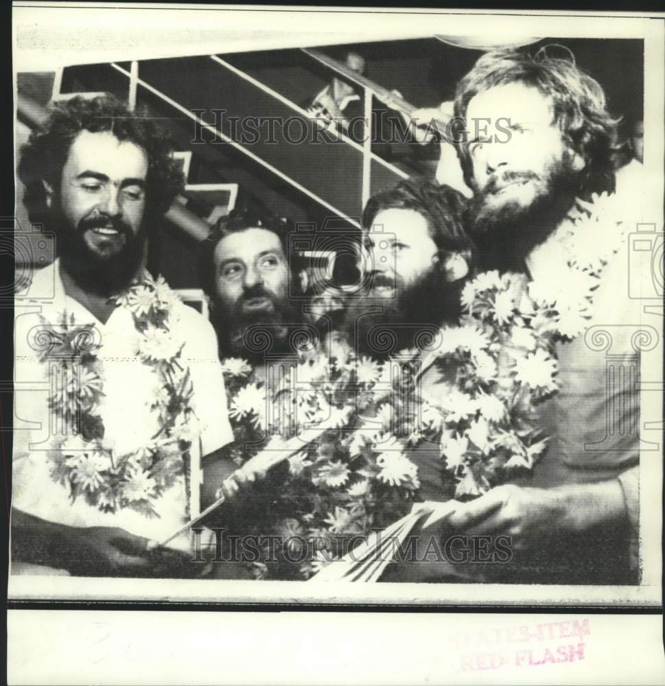 1970 Nambour, Australia- La Balsa rafting crew wear flower garlands - Historic Images