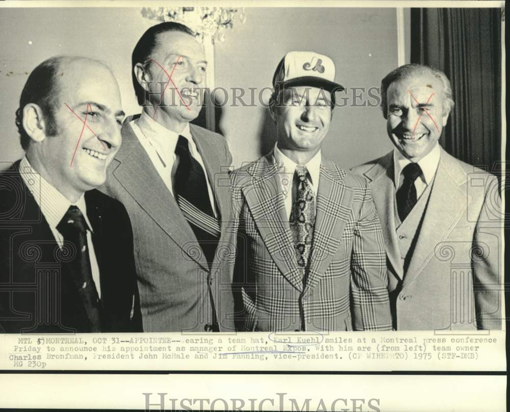 1975 Montreal Expos manager Earl Kuehl and others with newsmen. - Historic Images