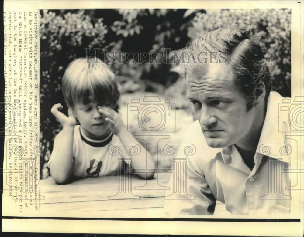 1974 Convicted White House "plumber," shown with son Matthew. - Historic Images