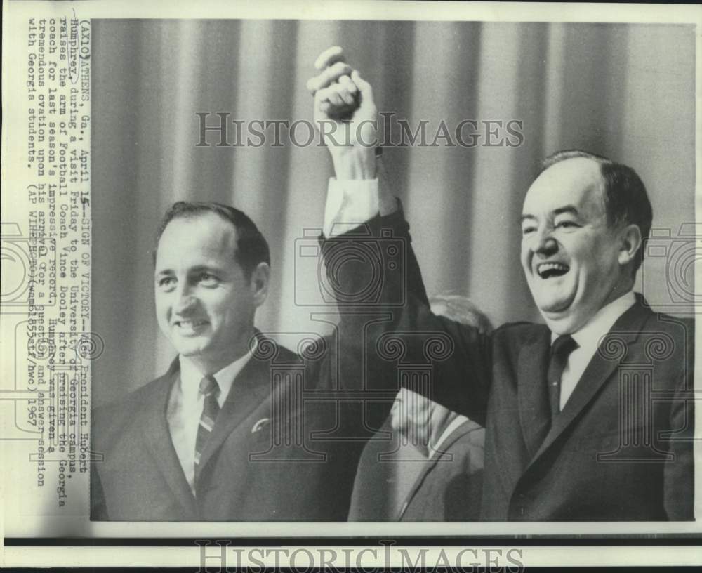 1967 Vice President Humphrey raises arm of Coach Vince Dooley in GA-Historic Images