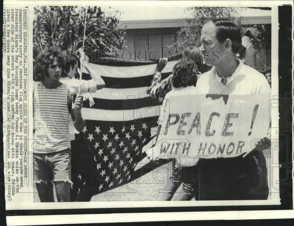 1970 Demonstrators on both sides of street in Key Biscayne, Florida - Historic Images