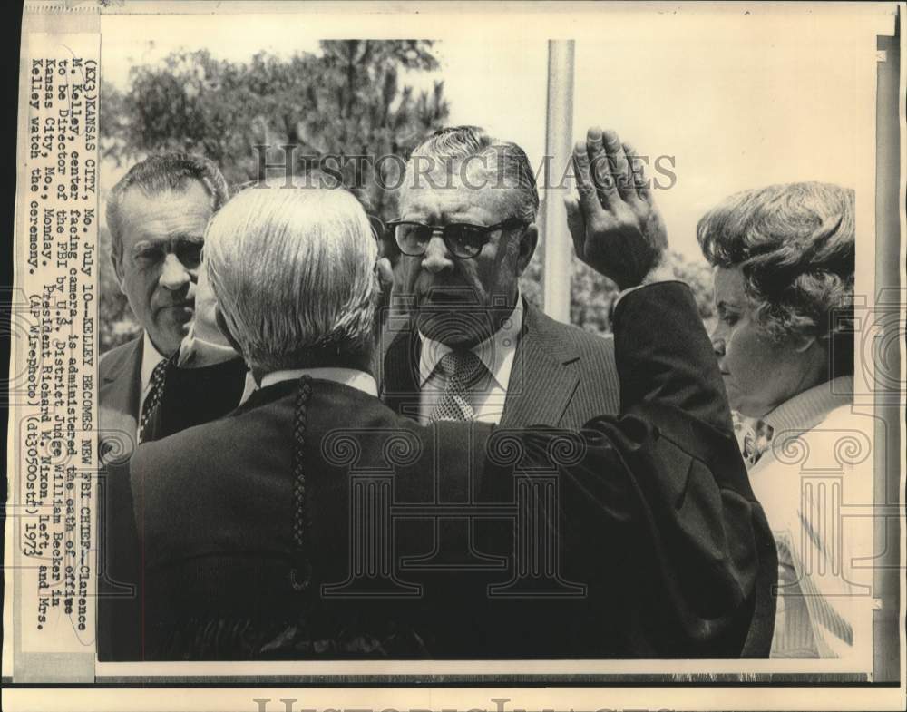 1973 Clarence Kelley becomes new FBI Chief as others watch. - Historic Images