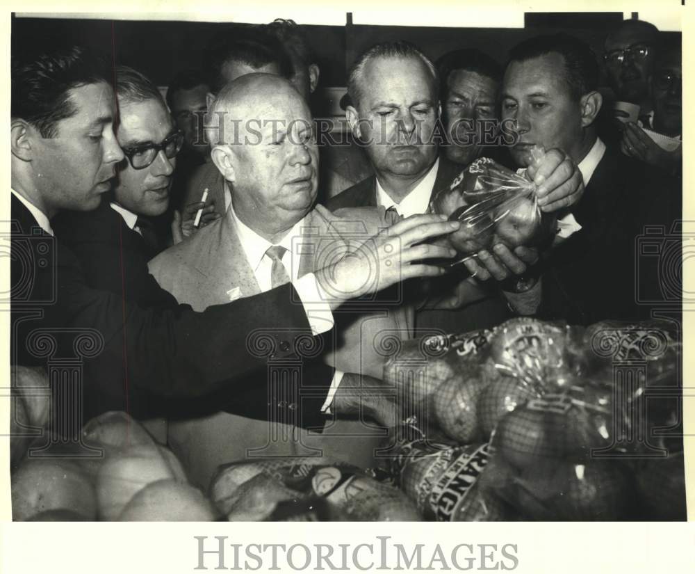 1959 Soviet Premier Khrushchev inquires the price of apples - Historic Images