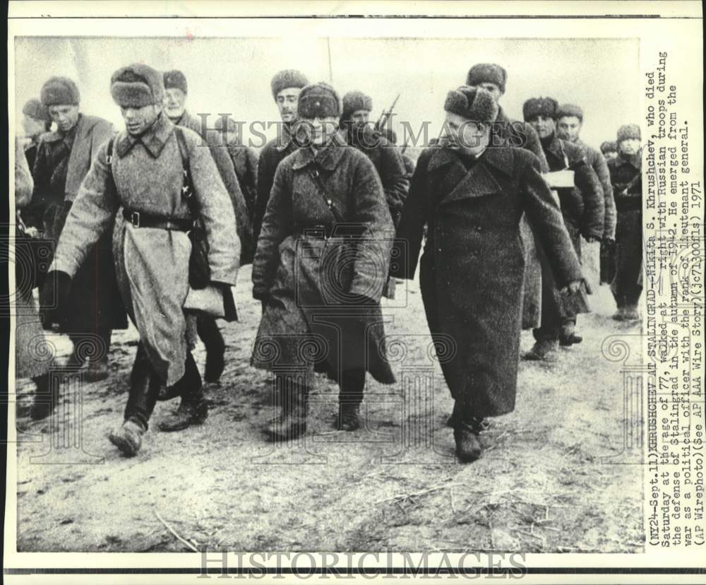 1942 Nikita Khrushchev walking with Russian troops in 1942 - Historic Images