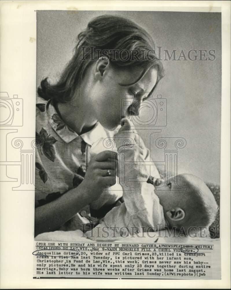 1964 Widow and son of PFC Carl Grimes who was killed in Vietnam. - Historic Images