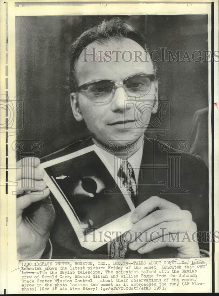 1973 Dr. Lubos Kohoutek shows photo of comet taken by Skylab crew. - Historic Images