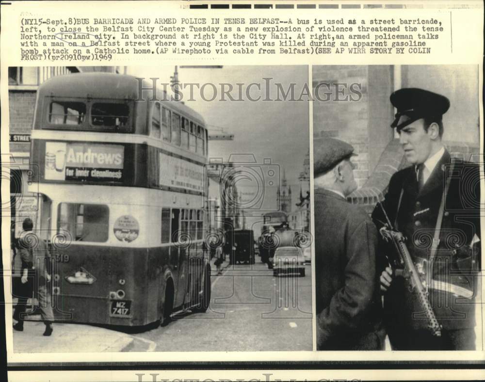 1969 Press Photo Bus barricade and armed police in tense Belfast - now15334-Historic Images