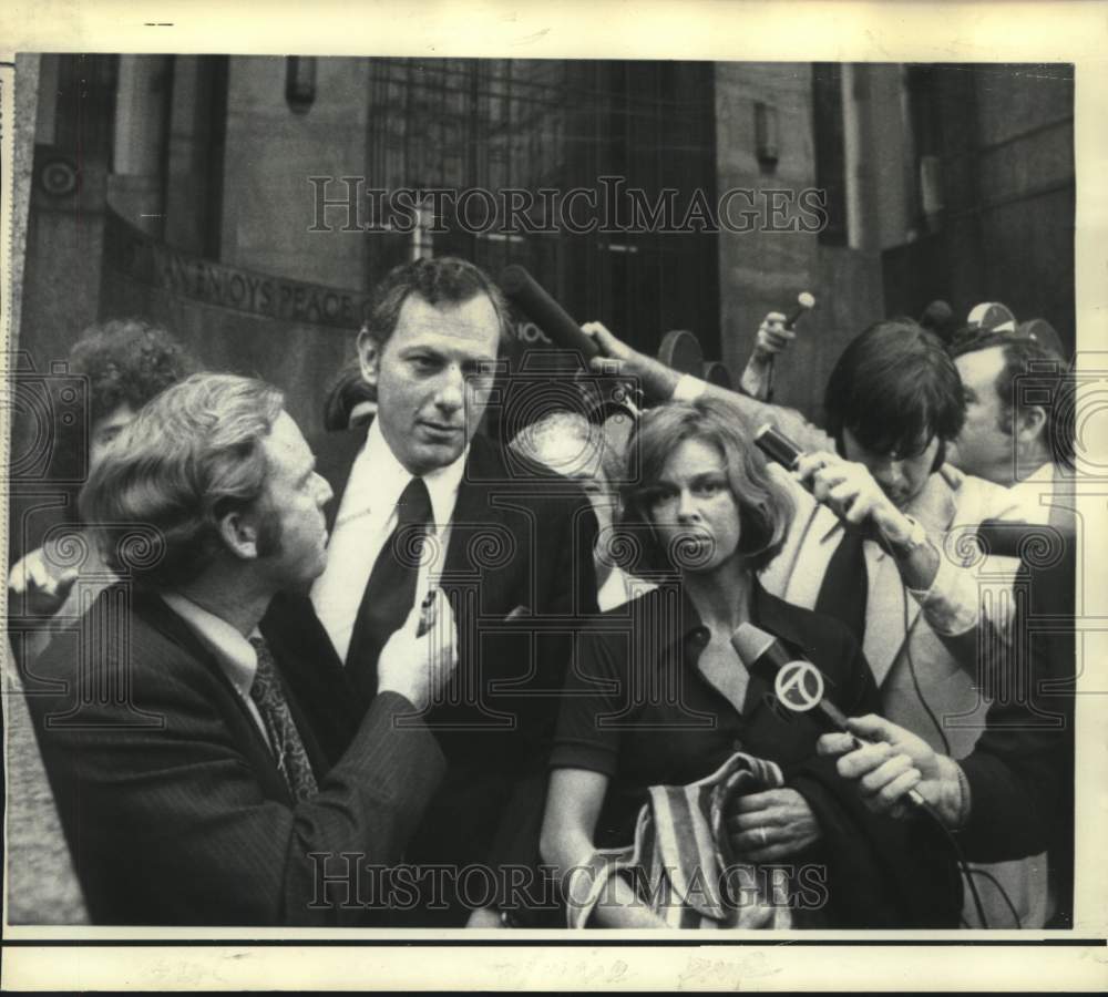 1972 Clifford and Edith Irving met by newsmen at State Supreme Court - Historic Images