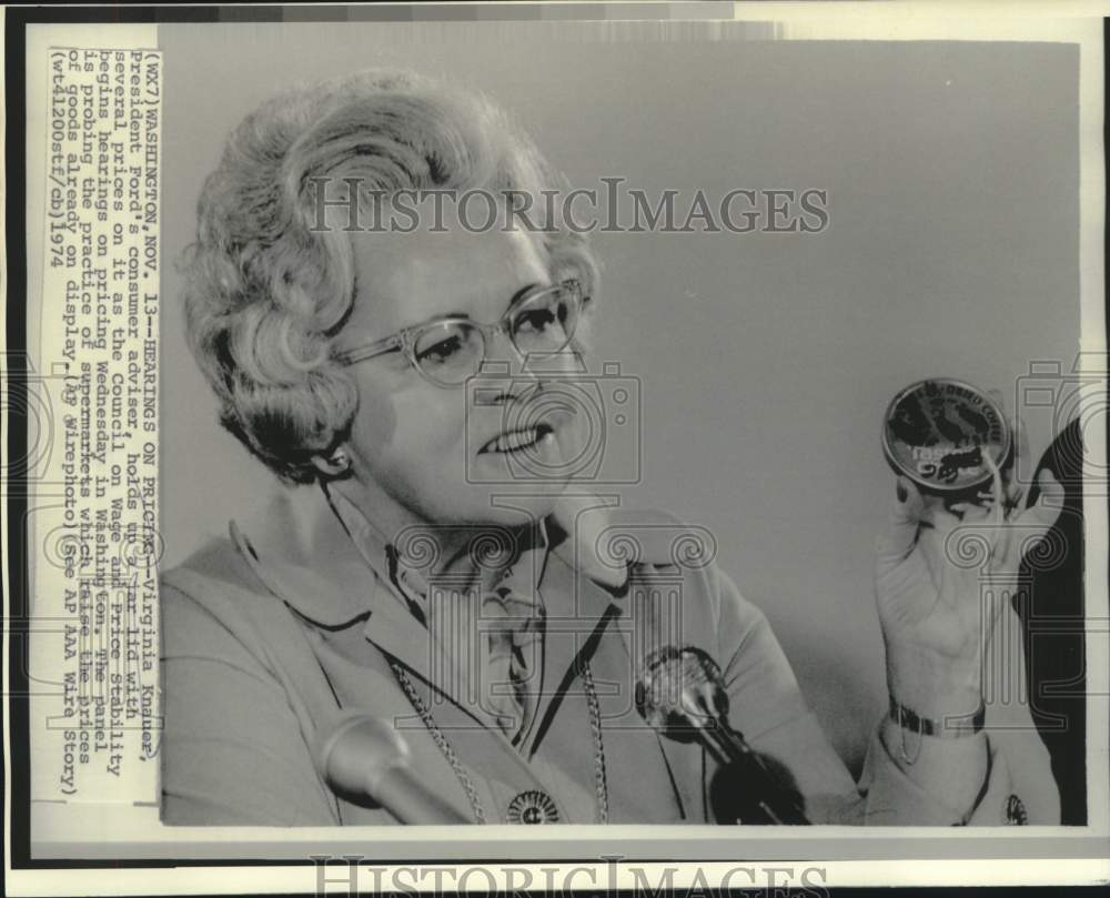 1974 Press Photo Virginia Knauer shows jar lid with various prices - now15721-Historic Images