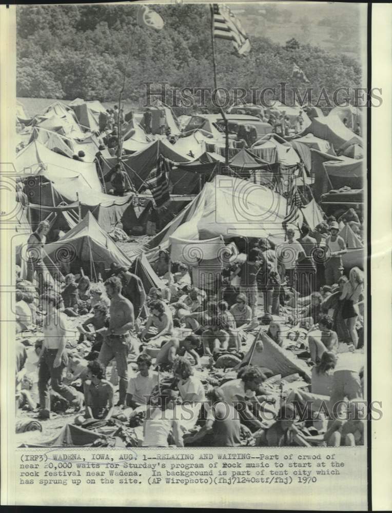 1970 Crowd and tent city residents wait for start of rock festival - Historic Images