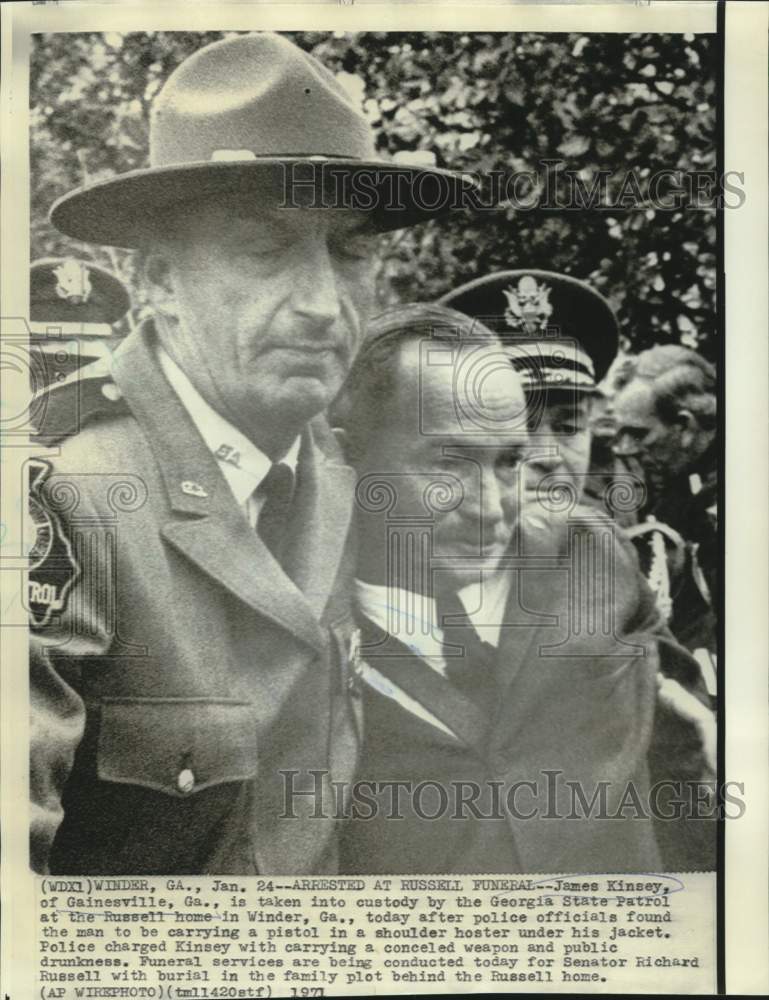 1971 Press Photo James Kinsey arrested at Senator Russell&#39;s funeral. - now17811-Historic Images