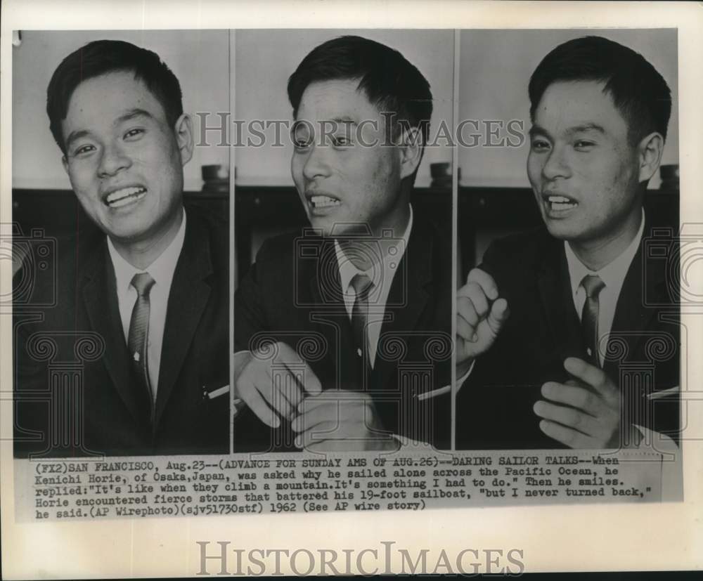 1962 Press Photo Kenichi Horie of Osaka, Japan discusses his Pacific Ocean sail-Historic Images