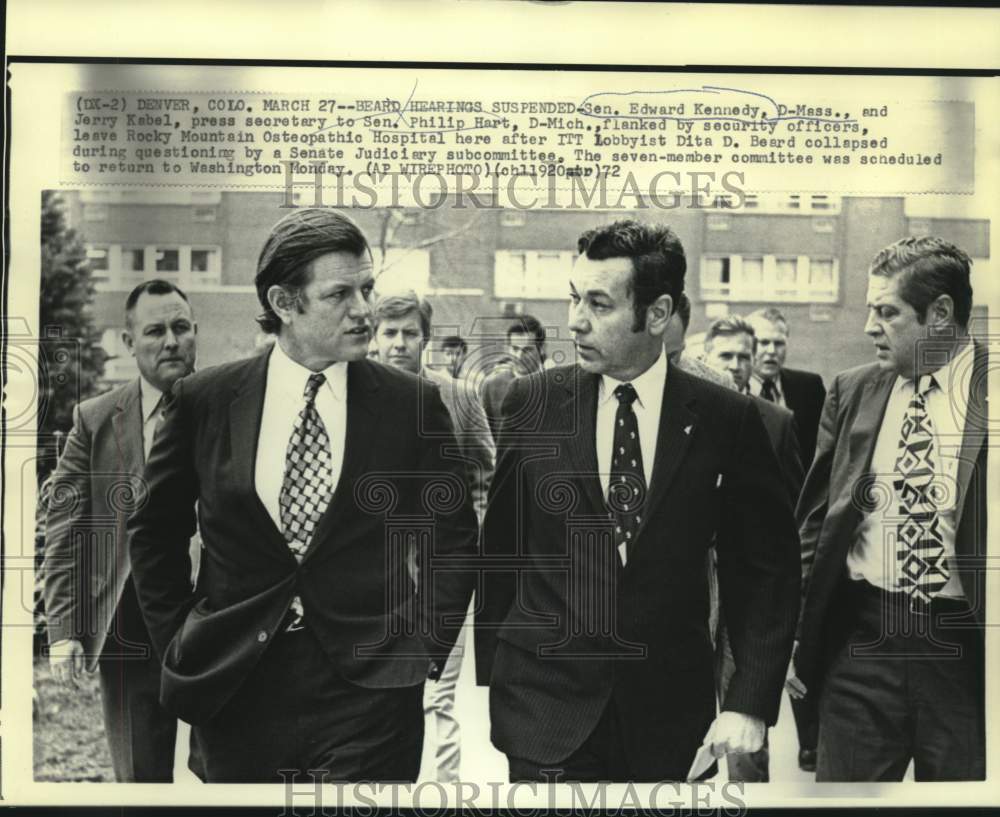 1972 Senator Edward Kennedy and Jerry Kabel, flanked by security - Historic Images