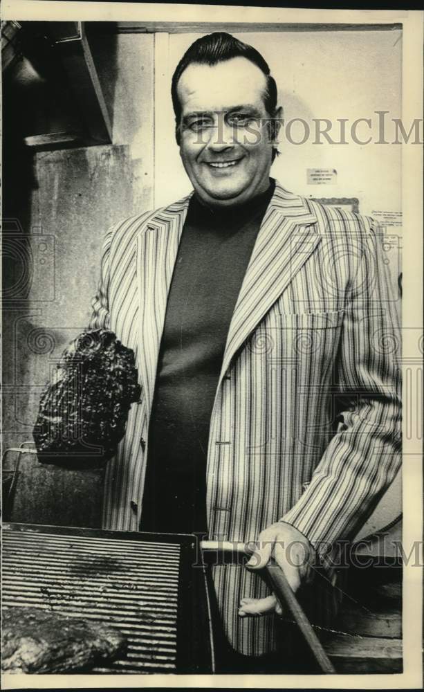 1972 Gino Marchetti elected as Hall of Fame member cooks steaks - Historic Images