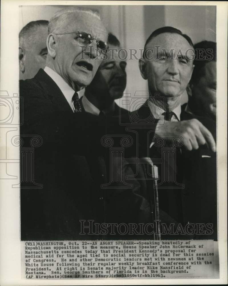 1963 House Speaker McCormack and others with newsmen at White House - Historic Images