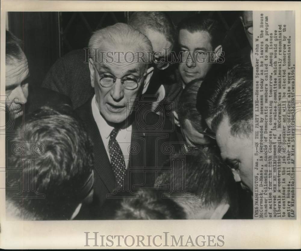 1963 House Speaker McCormack surrounded by newsmen at House Chamber - Historic Images