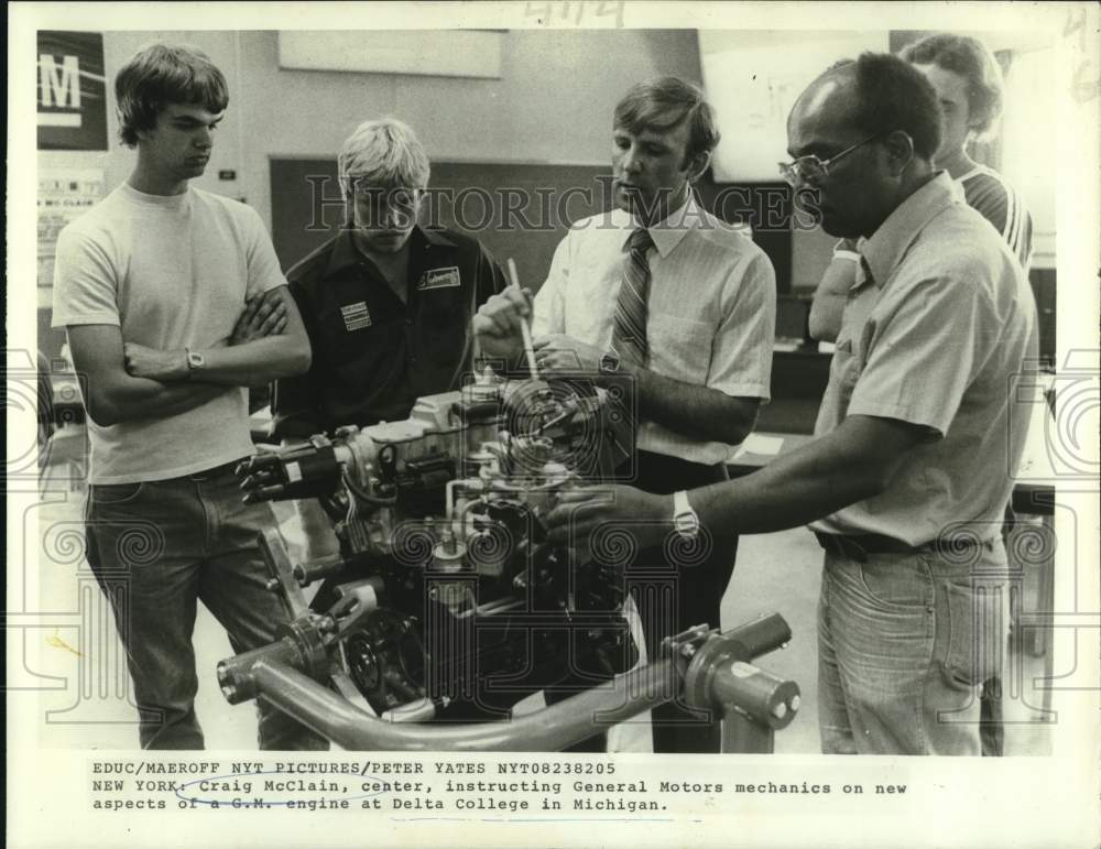 1982 Delta College&#39;s Craig McClain with General Motors&#39; mechanics - Historic Images