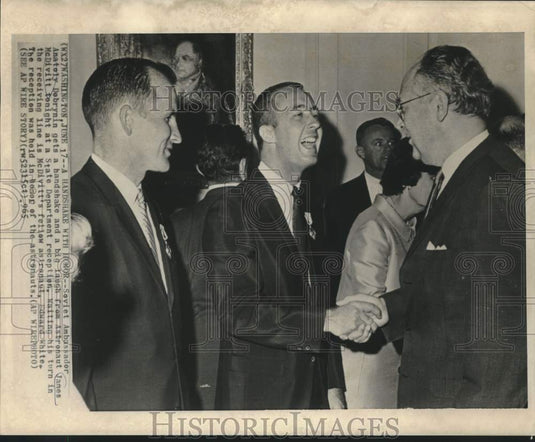 1965 Press Photo Anatoly Debrynin shakes hands with James McDivitt, Wash. DC-Historic Images