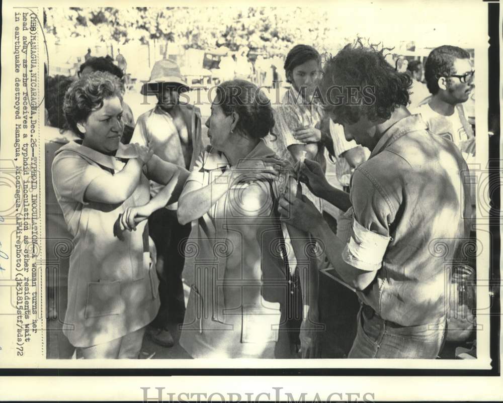 1972 Earthquake stricken Managua residents get typhoid inoculations - Historic Images