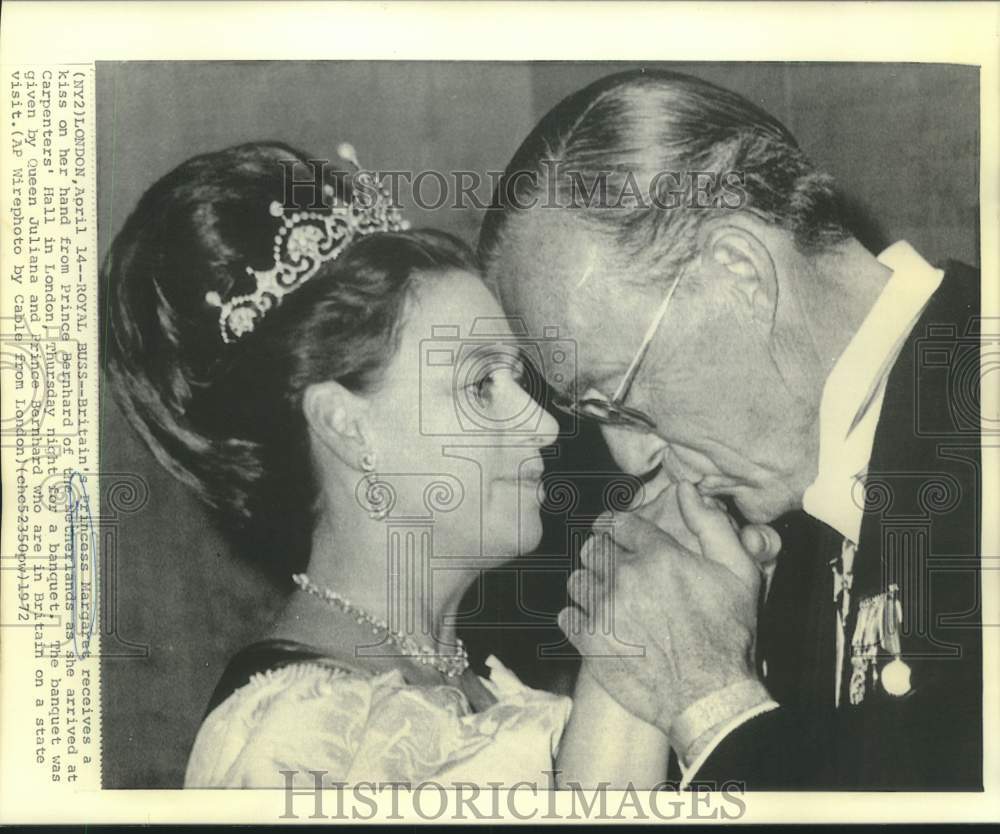 1972 Princess Margaret receives kiss on hand by Prince Bernard - Historic Images