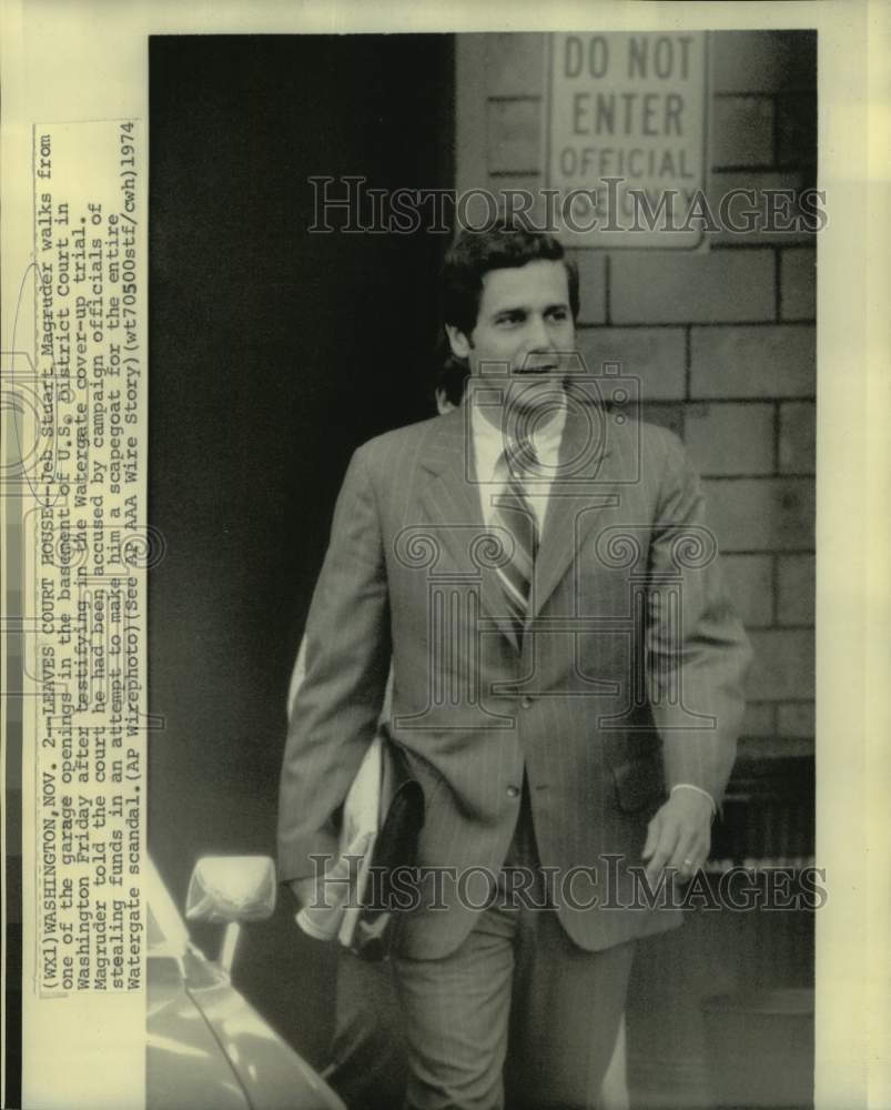 1974 Jeb Stuart Magruder walks from US District Court basement - Historic Images