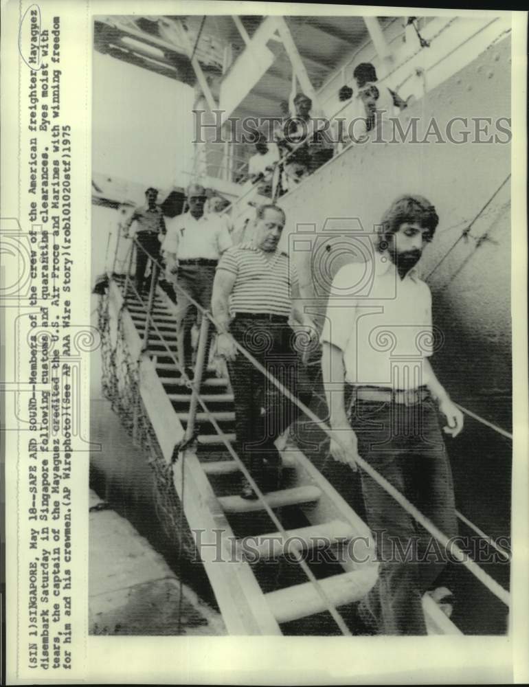 1975 American freighter Mayaguez crew disembark in Singapore - Historic Images