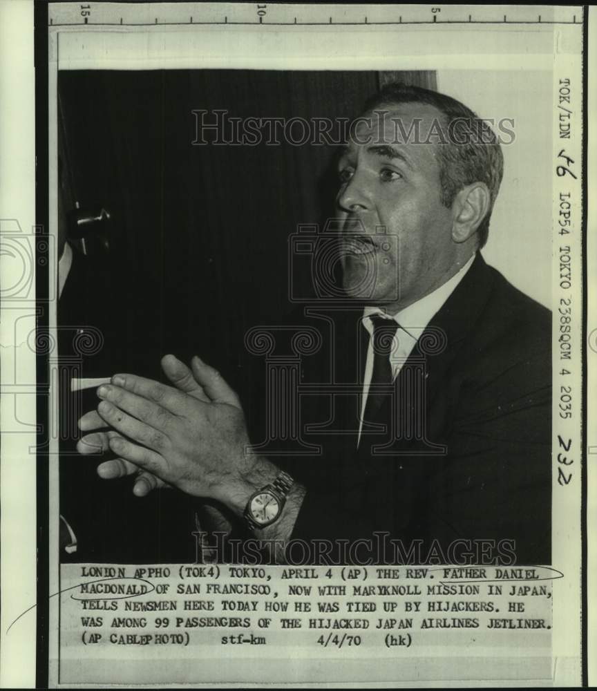 1970 Reverend MacDonald with newsmen after Japan Airlines hijacking - Historic Images