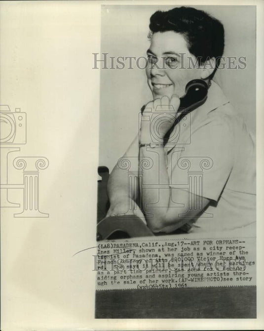 1961 Press Photo Victor Hugo Award for arts winner Inez Miller sits at her job - Historic Images