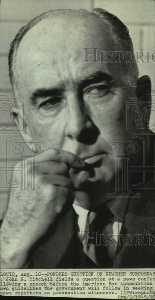 1970 Attorney General John Mitchell ponders news conference question - Historic Images