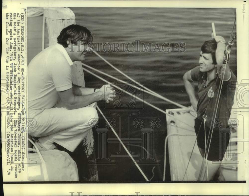 1974 Southern Cross designer Bob Miller and navigator Baxter chat - Historic Images