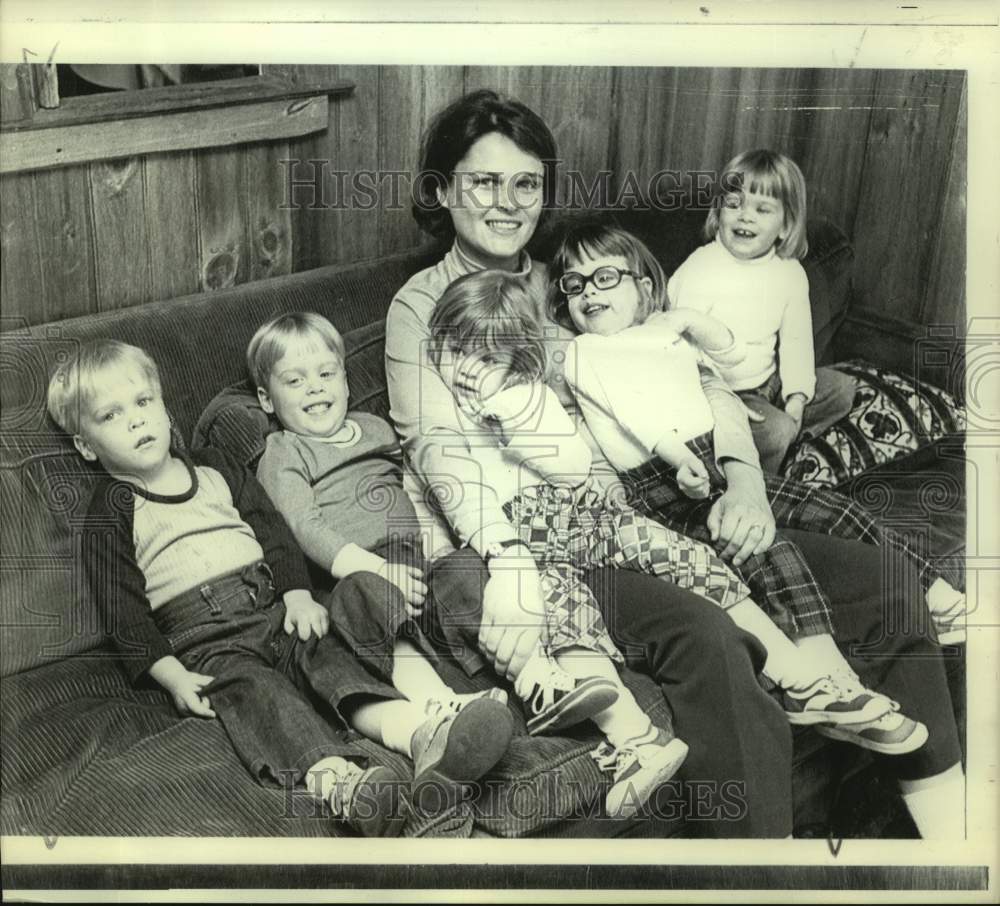 1973 Kienast quintuplets&#39; mother relaxes in New Jersey home. - Historic Images