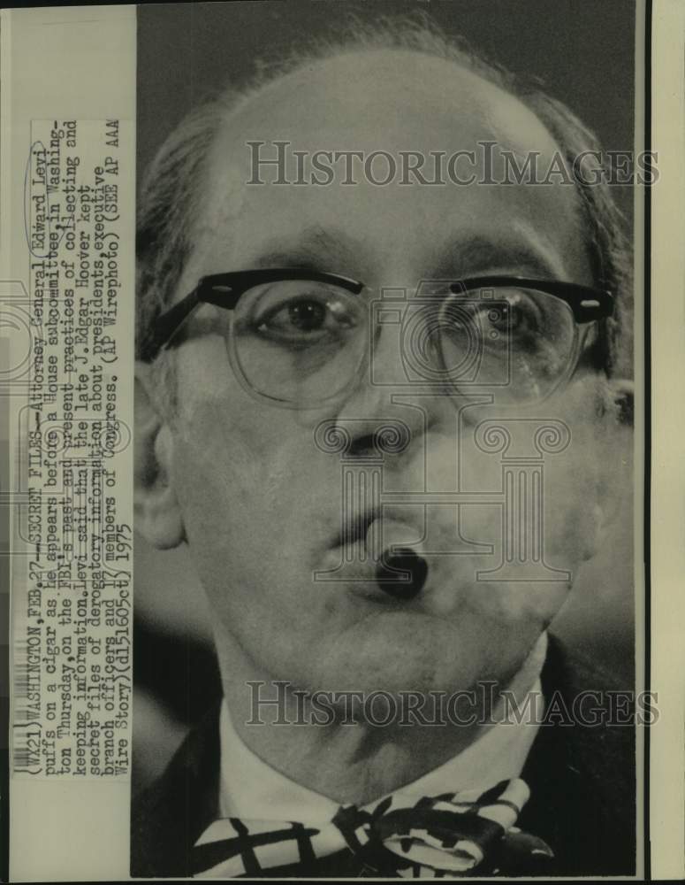 1975 Attorney General Levi puffs cigar at House subcommittee-Historic Images