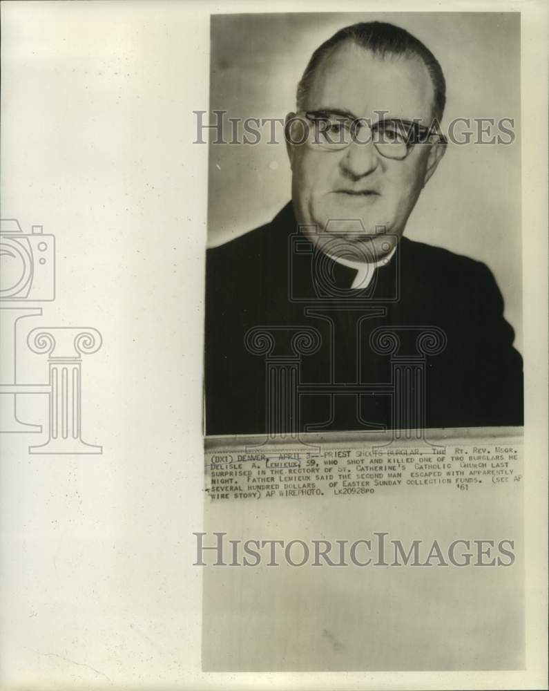 1961 Press Photo Reverend Delisle Lemieux of St. Catherine&#39;s surprises burglars. - Historic Images