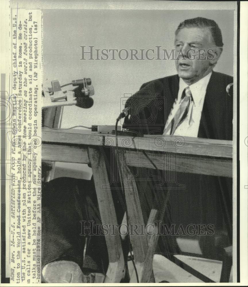 1974 U.S. World Food Deputy Chief Edwin Martin at news cnference - Historic Images