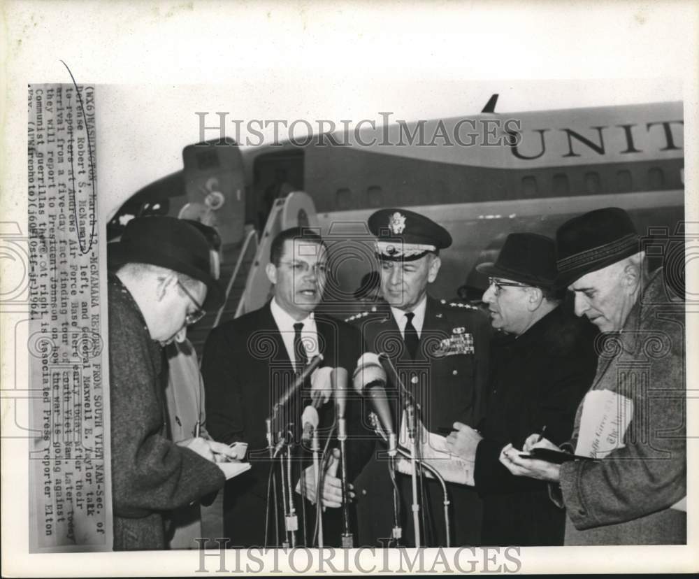 1964 Defense Secretary McNamara and Taylor with reporters at Andrews - Historic Images