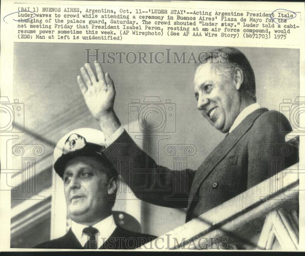 1975 Acting Argentine President Luder waves to Plaza de Mayo crowd - Historic Images