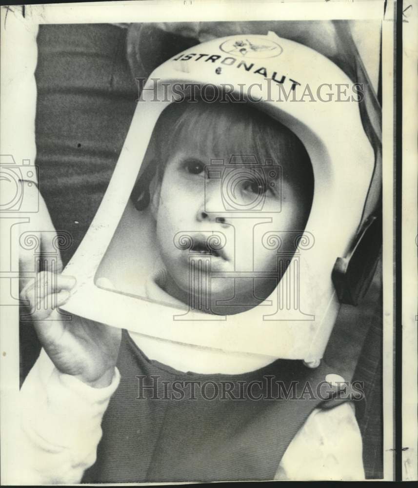 1968 Astronaut James Lovell&#39;s son Jeffrey wears space helmet. - Historic Images