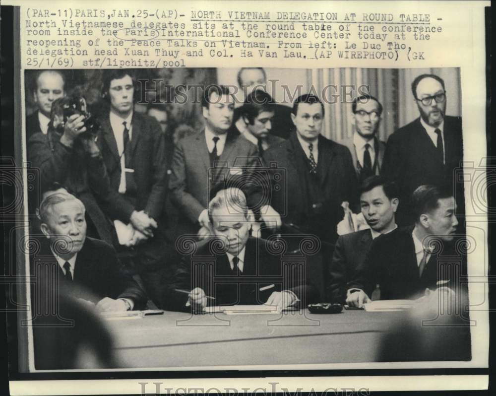 1969 North Vietnamese delegation at Paris Peace Talks round table - Historic Images