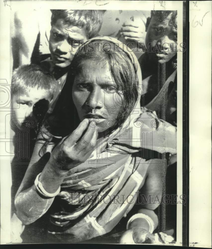 1970 Hungry Manpura, East Pakistan, woman with other storm victims - Historic Images