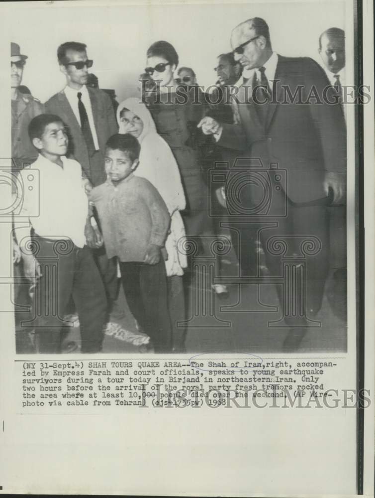 1968 Shah of Iran and royal party with Birjand earthquake survivors - Historic Images