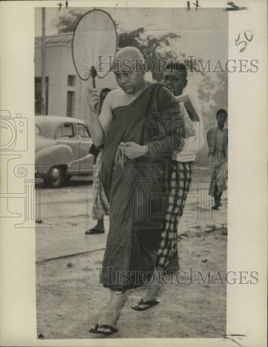1960 Burmese Prime Minister U Nu clad in Buddhist monk robe - Historic Images
