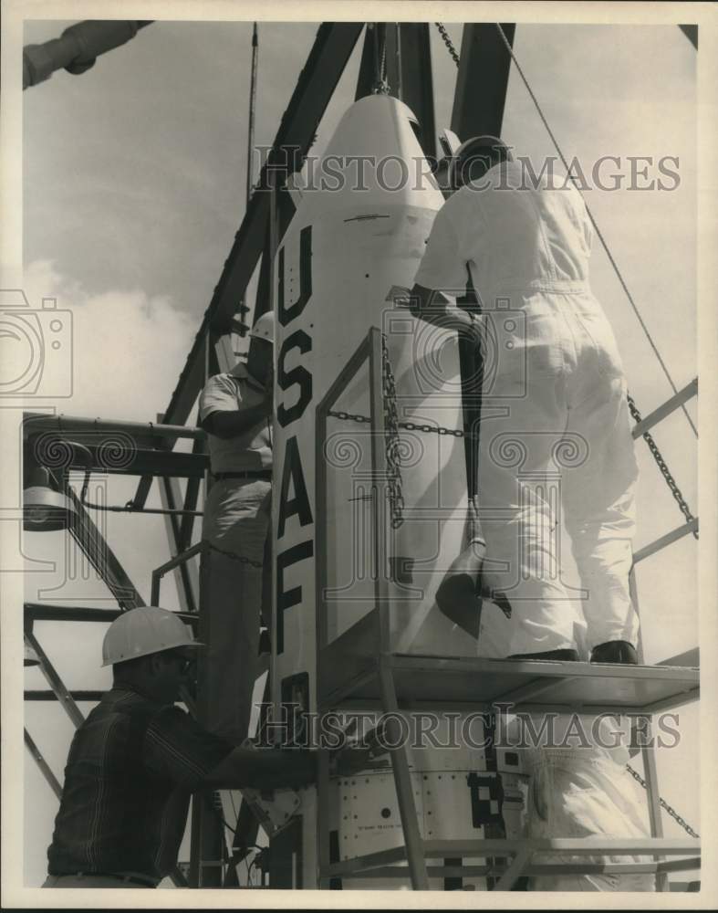 1961 Air Force personnel installing heat shields on Blue Scout - Historic Images