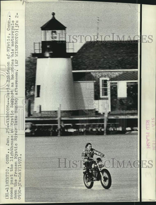 1971 Press Photo David Robinson Rides Motorcycle on Frozen Mystic River-Historic Images