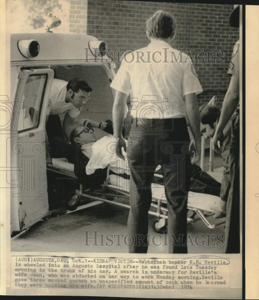 1974 Press Photo Kidnap victim E.B. Reville loaded into ambulance - now38954-Historic Images