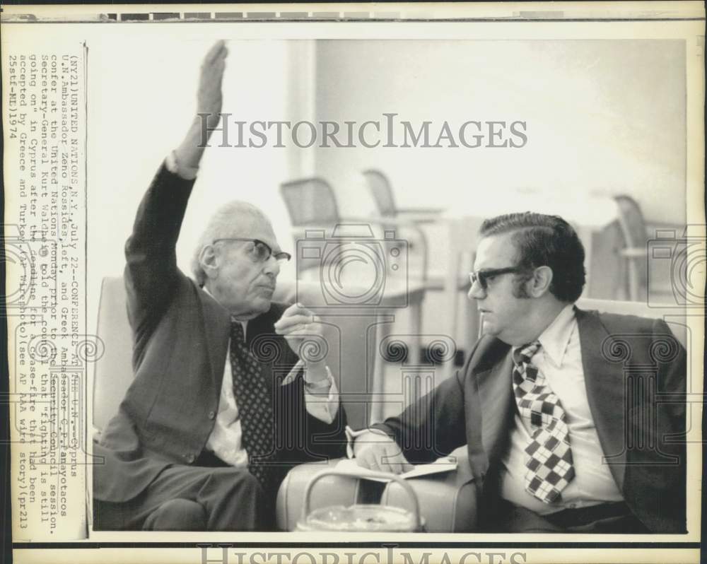 1974 Press Photo Ambassadors Zeno Rossides and C.P. Panagotacos confer at U.N.-Historic Images