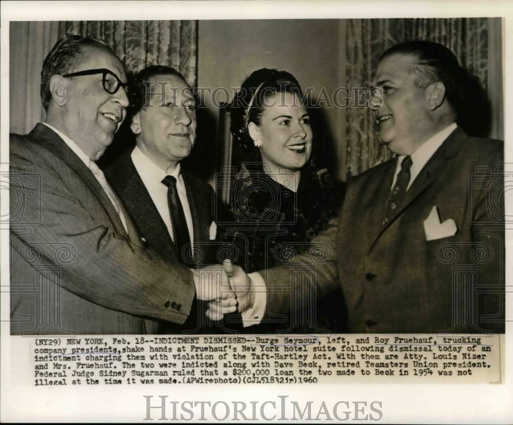 1960 Burge Seymour shakes hands with Roy Fruehauf in New York hotel-Historic Images