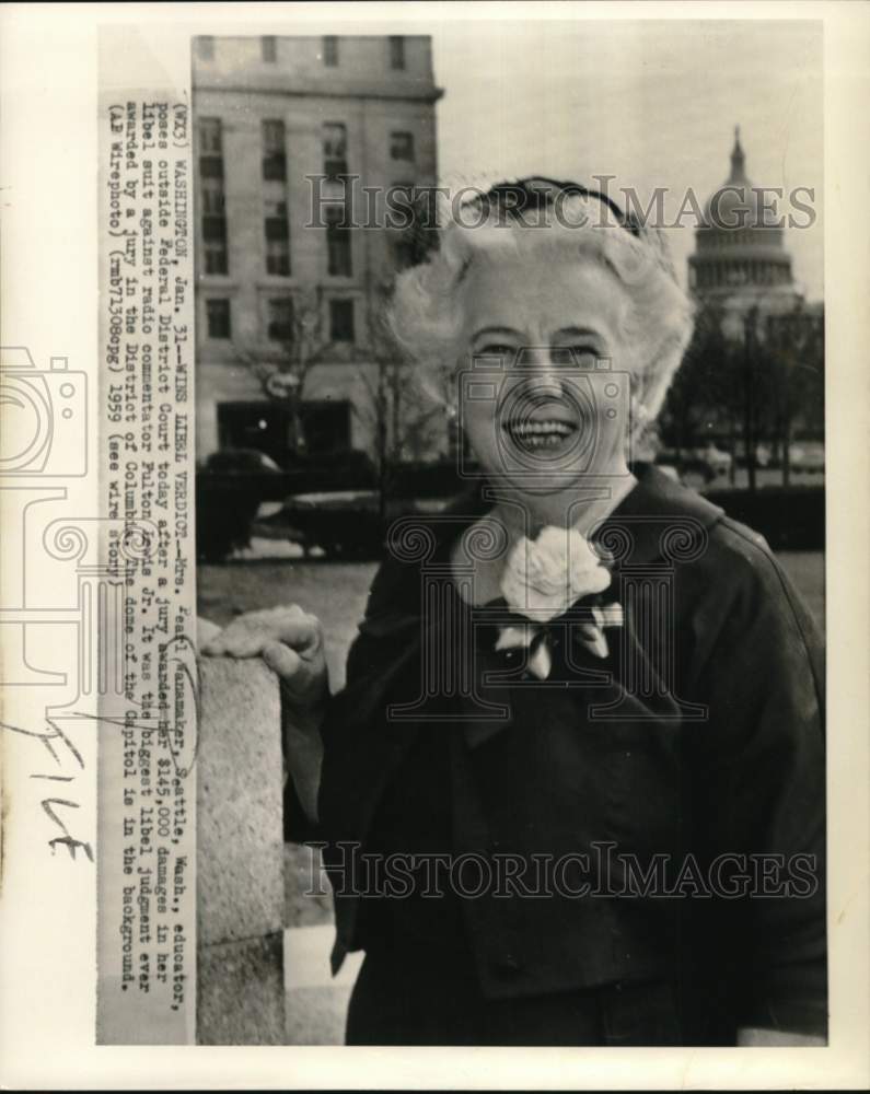 1959 Mrs. Pearl Wanamaker poses outside Federal District Court - Historic Images